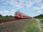 Eine DOSTO-Garnitur am 08.08.2012 bei Langenfeld in s�dlicher Richtung.